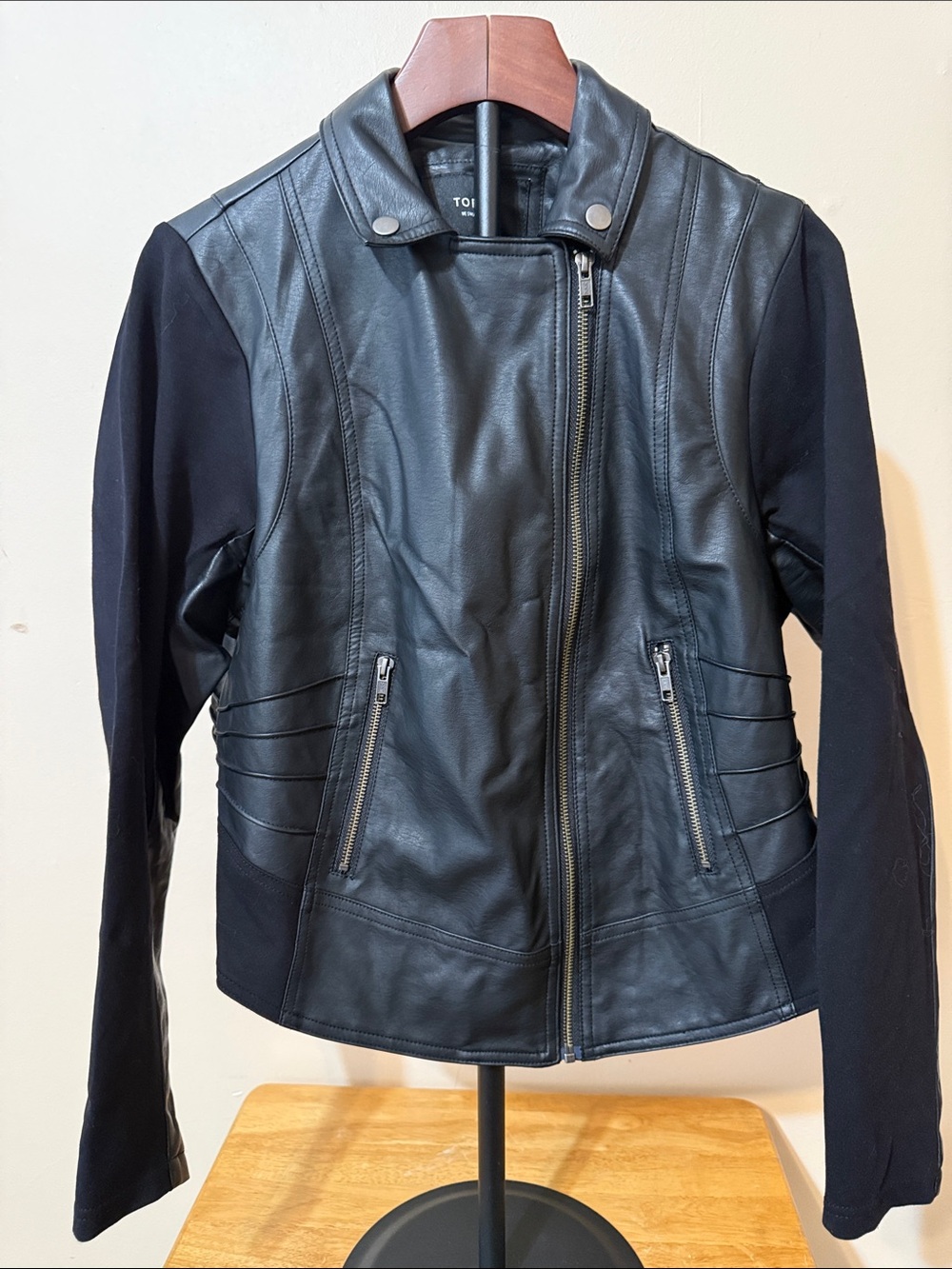 torrid Black Faux Leather Moto Jacket with Knit Sleeves and Zip Pockets